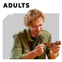 a person playing with a toy lego and age indicator