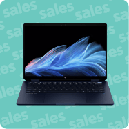 Laptop σε γαλάζιο φόντο με κυματιστή ταπετσαρία