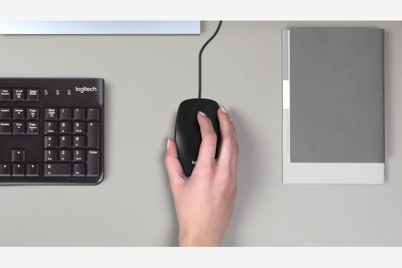 4132912-Tile-4-Logitech-M100